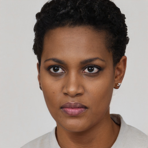 Neutral black young-adult female with short  black hair and brown eyes