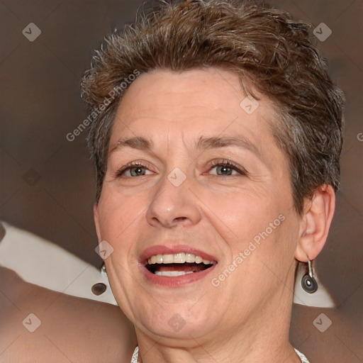 Joyful white adult female with short  brown hair and brown eyes