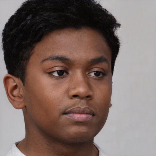 Neutral black young-adult male with short  brown hair and brown eyes