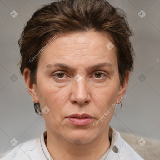 Joyful white adult female with short  brown hair and brown eyes