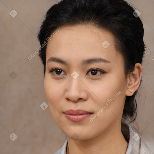 Joyful latino young-adult female with medium  brown hair and brown eyes