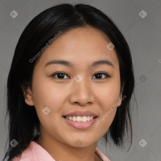 Joyful asian young-adult female with medium  black hair and brown eyes