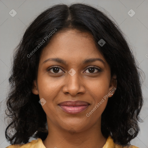 Joyful black young-adult female with medium  brown hair and brown eyes