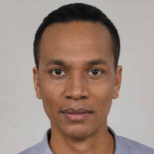 Neutral black adult male with short  black hair and brown eyes