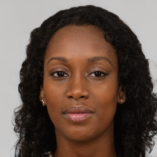 Neutral black young-adult female with long  black hair and brown eyes