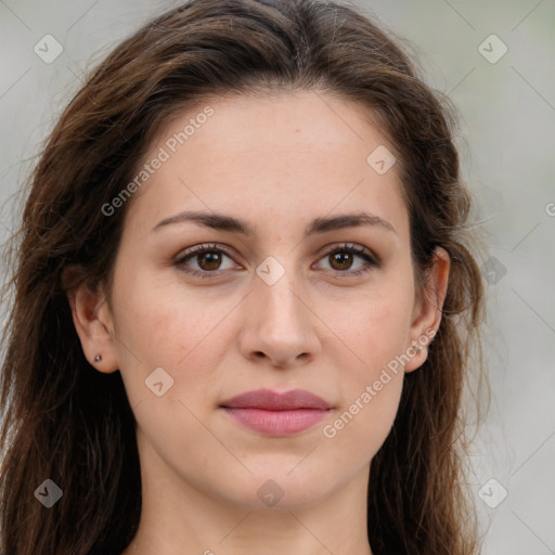 Joyful white young-adult female with long  brown hair and green eyes