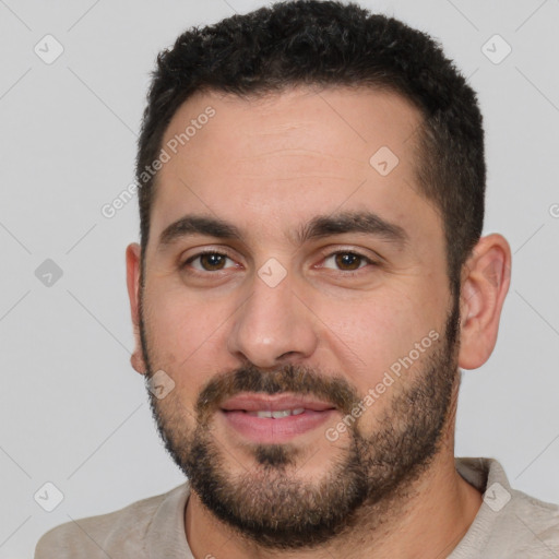 Joyful white young-adult male with short  black hair and brown eyes