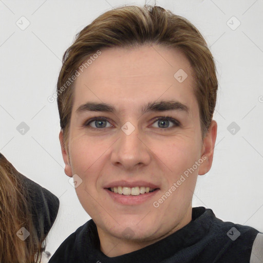 Joyful white young-adult female with long  brown hair and grey eyes