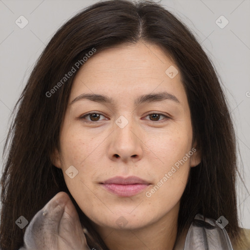 Joyful white young-adult female with long  brown hair and brown eyes