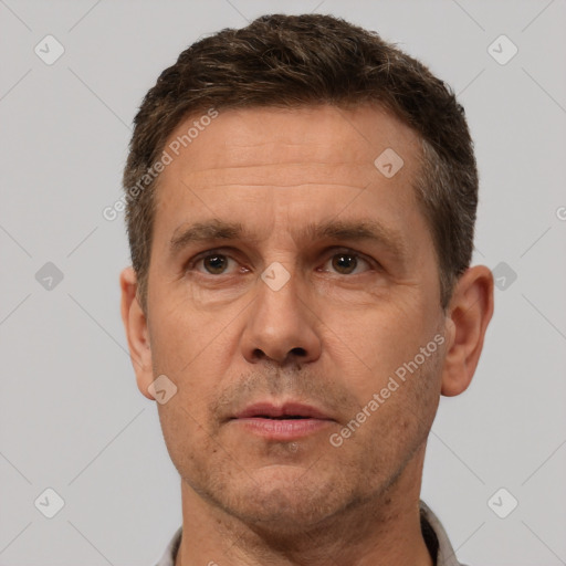 Neutral white adult male with short  brown hair and brown eyes