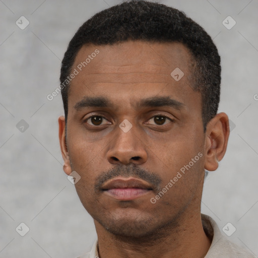 Neutral black young-adult male with short  black hair and brown eyes