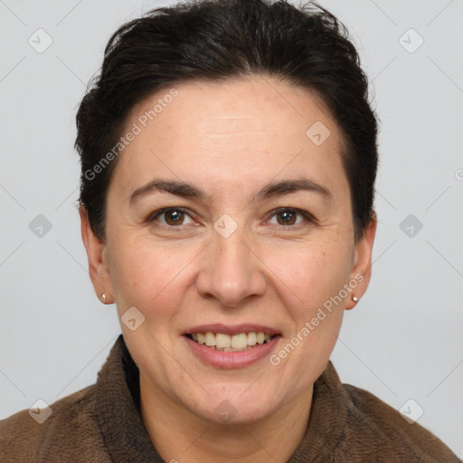 Joyful white adult female with short  brown hair and brown eyes