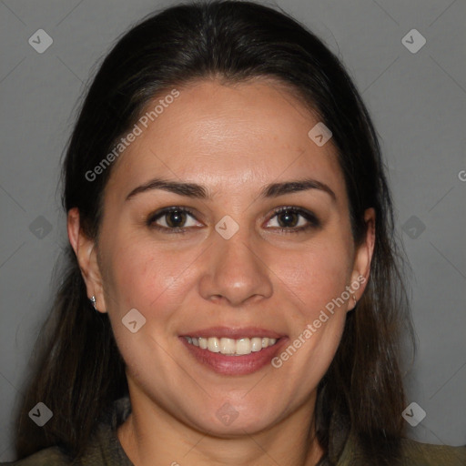 Joyful white adult female with medium  brown hair and brown eyes