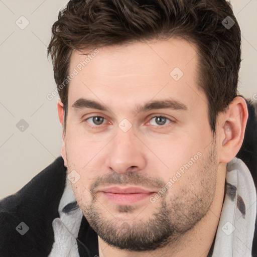 Neutral white young-adult male with short  brown hair and brown eyes