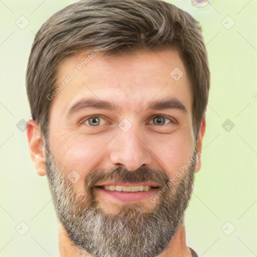 Joyful white adult male with short  brown hair and brown eyes
