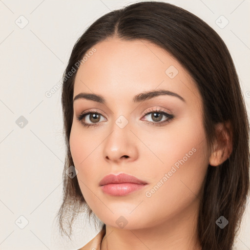 Neutral white young-adult female with long  brown hair and brown eyes