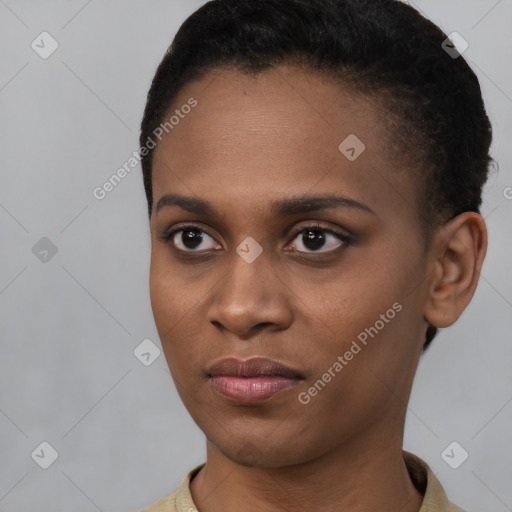 Joyful black young-adult female with short  brown hair and brown eyes