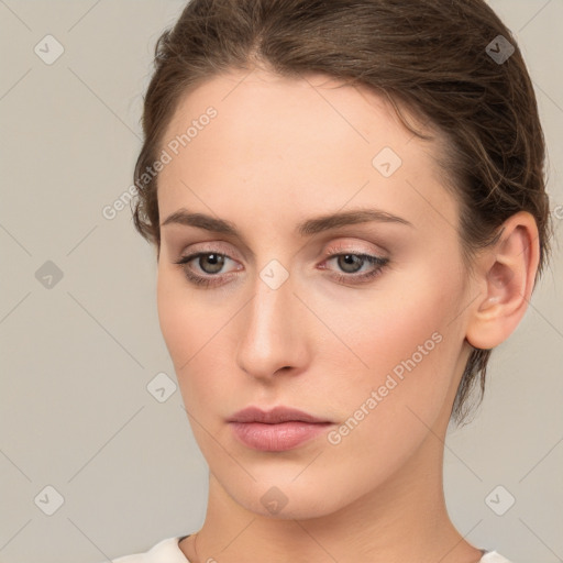 Neutral white young-adult female with medium  brown hair and brown eyes