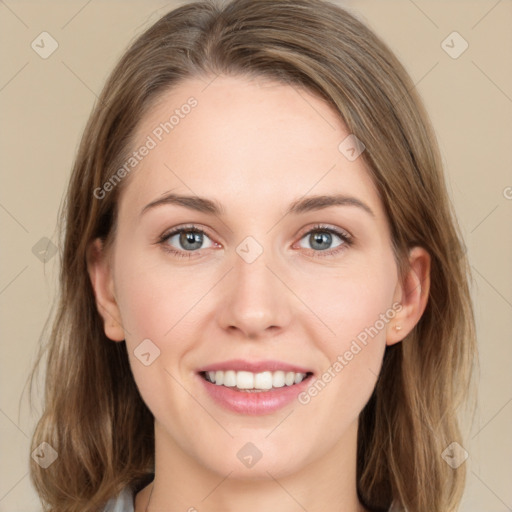 Joyful white young-adult female with medium  brown hair and green eyes