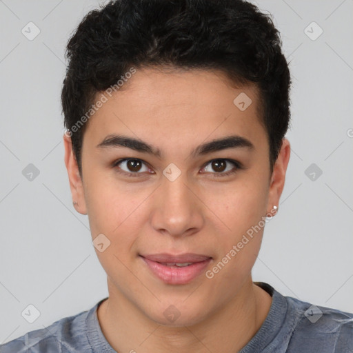 Joyful latino young-adult male with short  brown hair and brown eyes