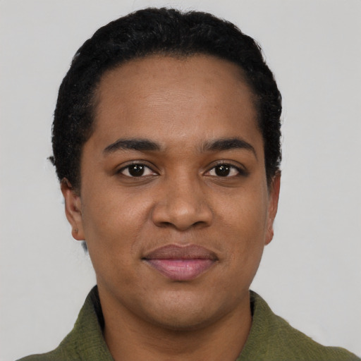 Joyful black young-adult male with short  black hair and brown eyes