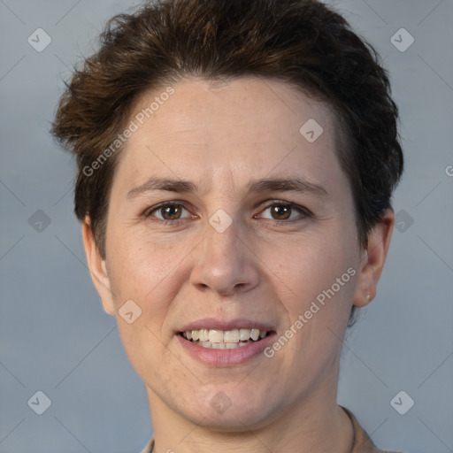 Joyful white adult female with short  brown hair and brown eyes