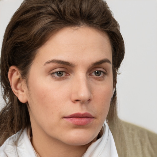 Neutral white young-adult female with medium  brown hair and grey eyes