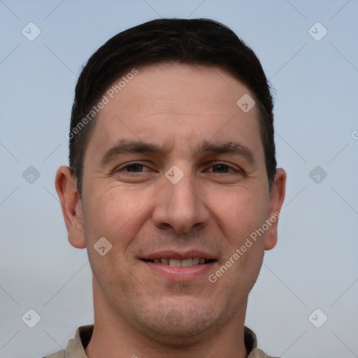 Joyful white adult male with short  brown hair and brown eyes