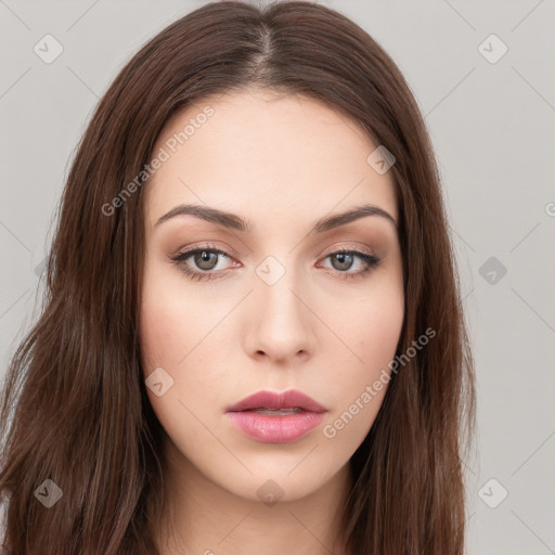 Neutral white young-adult female with long  brown hair and brown eyes