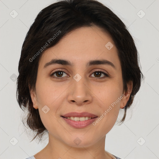 Joyful asian young-adult female with medium  brown hair and brown eyes