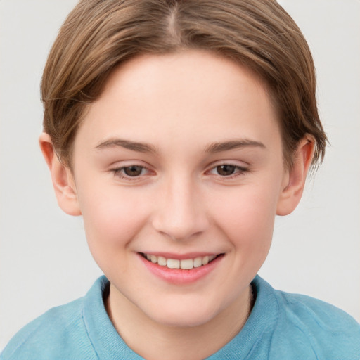 Joyful white child female with short  brown hair and brown eyes