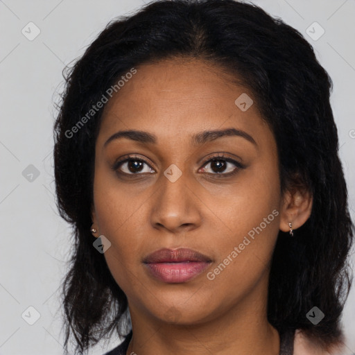 Neutral black young-adult female with long  brown hair and brown eyes