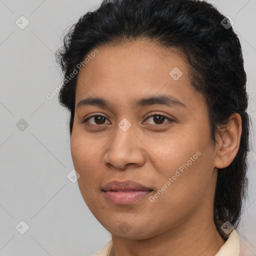 Joyful latino young-adult female with short  brown hair and brown eyes