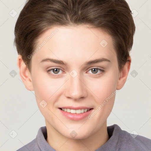 Joyful white young-adult female with short  brown hair and grey eyes