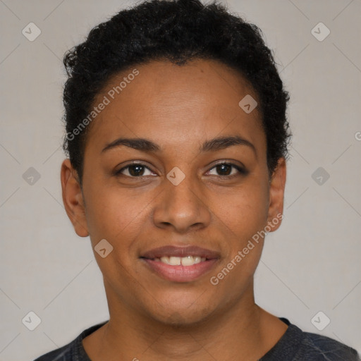 Joyful black young-adult female with short  brown hair and brown eyes