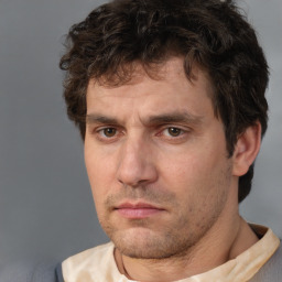 Neutral white adult male with short  brown hair and brown eyes