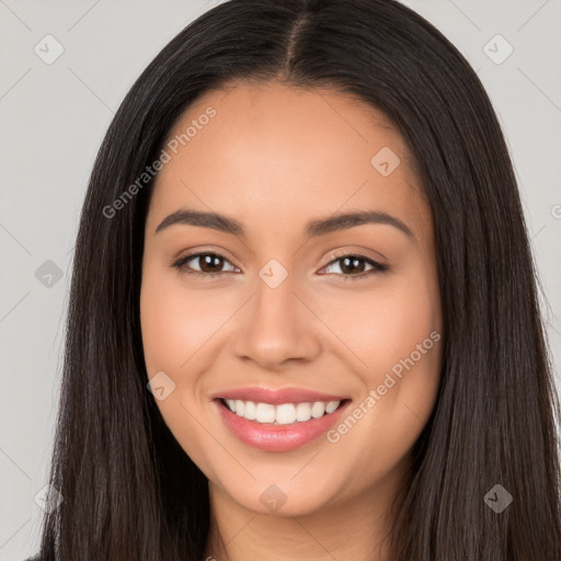 Joyful white young-adult female with long  black hair and brown eyes