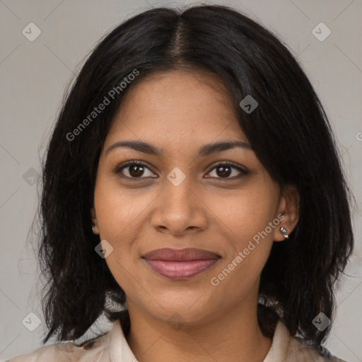 Joyful black young-adult female with medium  black hair and brown eyes