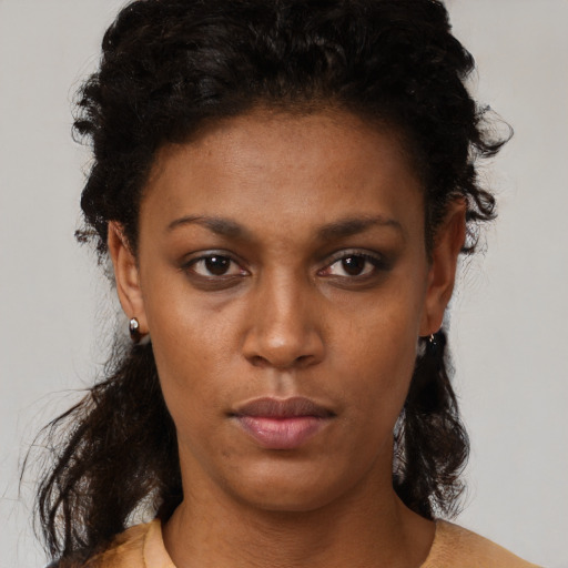 Neutral black young-adult female with short  brown hair and brown eyes