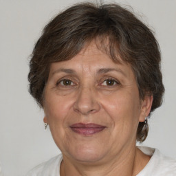 Joyful white middle-aged female with short  brown hair and brown eyes