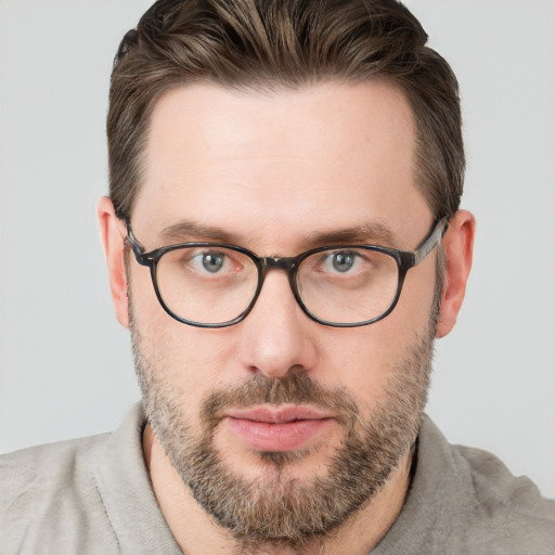 Neutral white young-adult male with short  brown hair and grey eyes