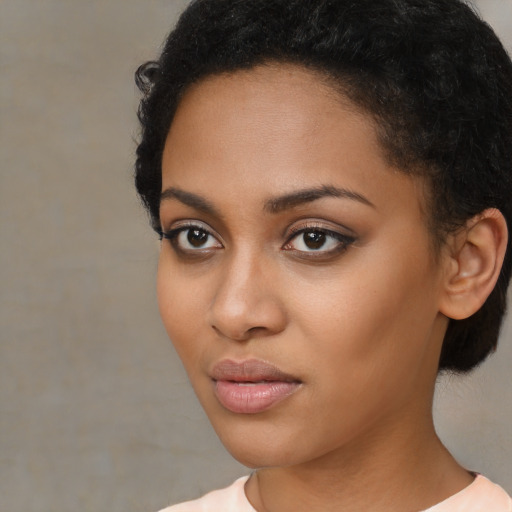 Neutral latino young-adult female with short  black hair and brown eyes