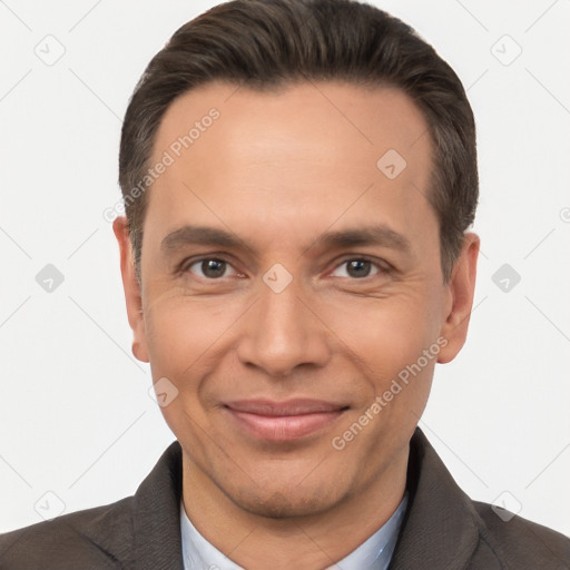 Joyful white adult male with short  brown hair and brown eyes