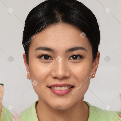 Joyful asian young-adult female with short  brown hair and brown eyes