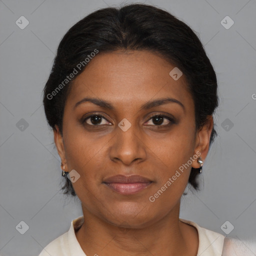 Joyful black young-adult female with medium  brown hair and brown eyes