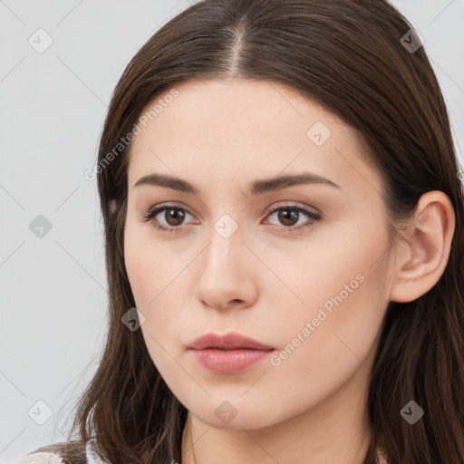 Neutral white young-adult female with long  brown hair and brown eyes