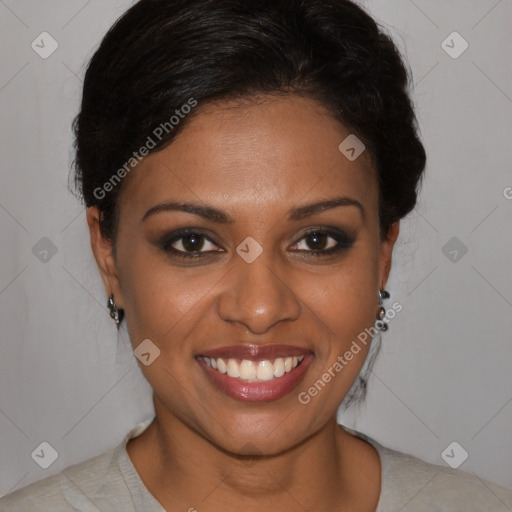 Joyful black young-adult female with short  brown hair and brown eyes