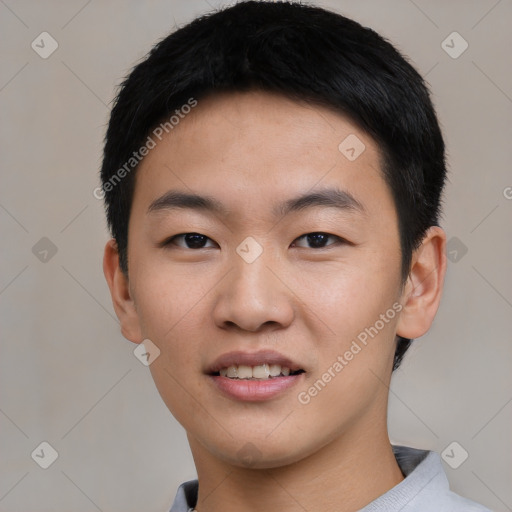 Joyful asian young-adult male with short  black hair and brown eyes