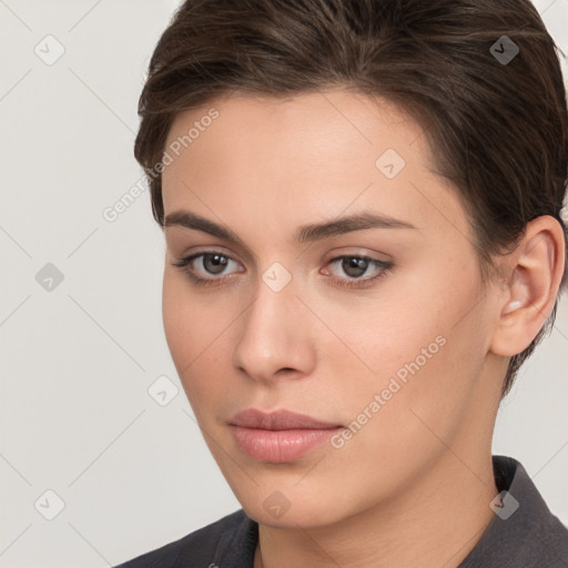 Neutral white young-adult female with short  brown hair and brown eyes