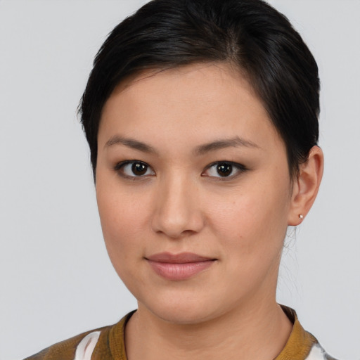 Joyful white young-adult female with medium  brown hair and brown eyes